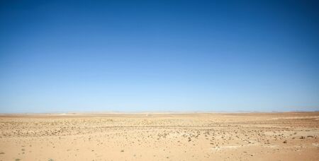 Rocky desert at the beginning of Sahara in the middle of Tunisia.の写真素材