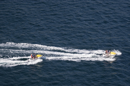 ACAPULCO, MEXICO - FEBRUARY 19, 2006: Two couples riding jet skis in the bay of Acapulco, Mexico.のeditorial素材