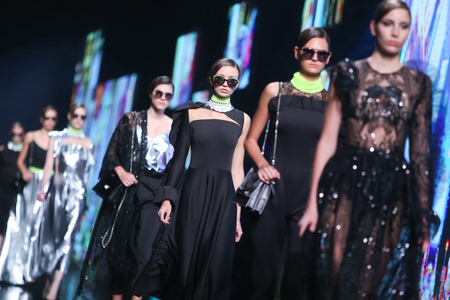 ZAGREB, CROATIA- OCTOBER 12, 2016: Fashion model wearing clothes for autumn-winter, designed by eNVy room on the Bipa Fashion.hr fashion show in Zagreb, Croatia.のeditorial素材