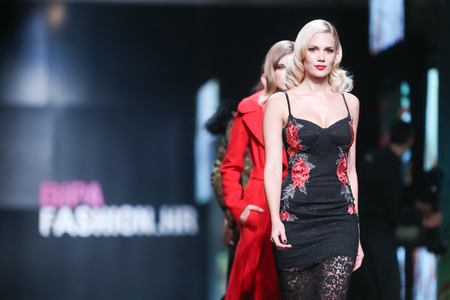 ZAGREB, CROATIA - OCTOBER 14, 2016: Fashion model wearing clothes for autumn-winter, designed by Elfs on the Bipa Fashion.hr fashion show in Zagreb, Croatia.のeditorial素材
