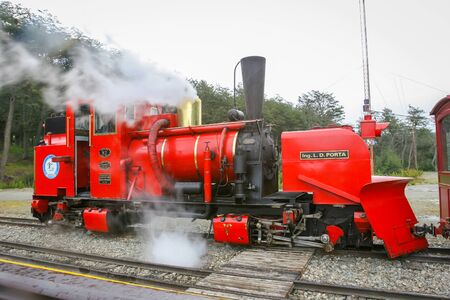 USHUAIA, ARGENTINA - FEBRUARY 2, 2006 :  Steam comming out of the train called Train of the End of the World at the Tierra del Fuego National Park in Ushuaia, Argentina. The Southern Fuegian Railway is the southernmost functioning railway in the world.のeditorial素材