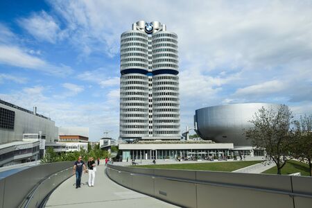 MUNICH, GERMANY - MAY 6, 2017 : People walking on the bridge connecting the BMW Museum with the BMW Welt exhibition center in Munich, Germany.のeditorial素材