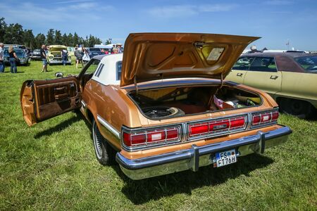 NANDLSTADT, GERMANY - MAY 6, 2017 : People sightseeing american automobile Ford Elite displayed at the US Car meeting in Nandlstadt, Germany.のeditorial素材