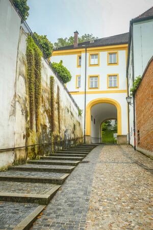 FREISING, GERMANY - MAY 8, 2017 : A view of the romanesque building with entrance to Domberg and basilica Saint Mary and Corbinian Cathedral in Freising, Germany.のeditorial素材