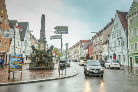 FREISING, GERMANY - MAY 8, 2017: Traditional german architecture with people walking in the street in Freising, Germany.のeditorial素材