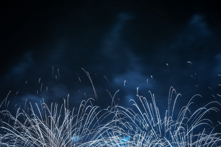 Brightly colorful fireworks on twilight background.の写真素材