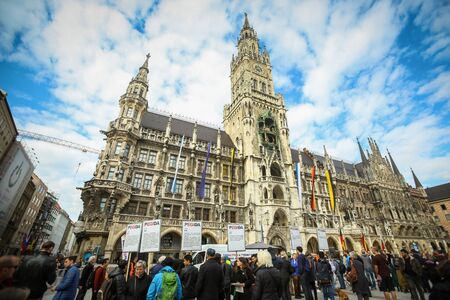 MUNICH, GERMANY - MAY 9, 2017 : People sightseeing the New Town Hall at Marienplatz in Munich, Germany.のeditorial素材