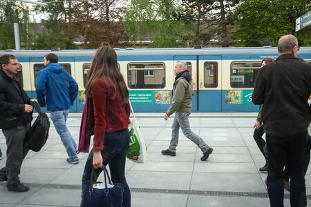 MUNCHEN, GERMANY - MAY 9, 2017 : People in transit on the subway system in Munich, Germany. About...