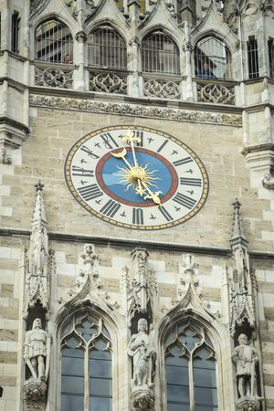 MUNICH, GERMANY - MAY 9, 2017 : The clock tower of the New Town Hall at Marienplatz in Munich, Germany.のeditorial素材