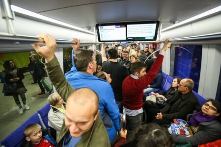 MUNCHEN, GERMANY - MAY 9, 2017 : People in train on the subway system in Munich, Germany. About 350...
