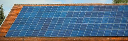 Solar panels installed on a roof of a house.