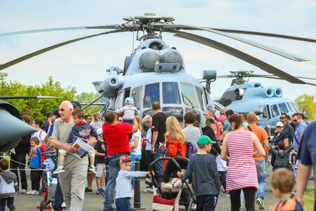 VELIKA GORICA, CROATIA - MAY 13, 2017 : People sightseeing the Mi 171 Sh helicopter exhibited at the AIRVG2017, the aviation day in Velika Gorica, Croatia.のeditorial素材