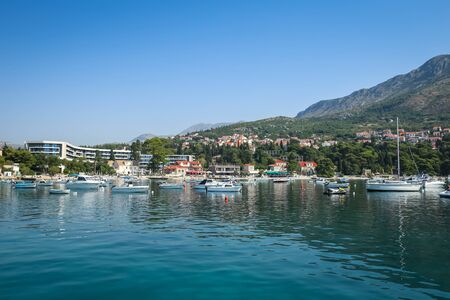SREBRENO, CROATIA - JULY 21, 2017 : The Sheraton hotel in a small town Srebreno with boats anchored on mediterranean coast in Dalmatia, Srebreno, Croatia.のeditorial素材
