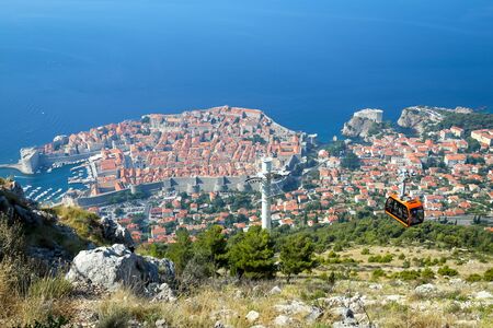 Srd hill, a mountain behind the ancient old town Dubrovnik with cable car in Dalmatia, Croatia.の写真素材