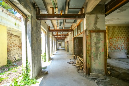 KUPARI, CROATIA - JULY 19, 2017 : The hallway of an old ruined hotel Grand in abandoned Yugoslavian military resort in Kupari, Croatia.のeditorial素材