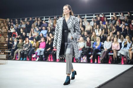 ZAGREB, CROATIA - OCTOBER 25, 2017 : Fashion model wearing clothes for autumn - winter, designed by...