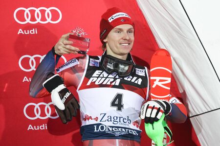 ZAGREB, CROATIA - JANUARY 4, 2018 : Henrik Kristoffersen from Norway celebrates his third place during award ceremony of the Audi FIS Alpine Ski World Cup Men's Slalom, Snow Queen Trophy 2018 in Zagreb, Croatia.のeditorial素材