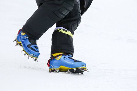 ZAGREB, CROATIA - JANUARY 3, 2018 : Detail of the boots with crampons on the frozen ski run on the Audi FIS Alpine Ski World Cup Women's Slalom, Snow Queen Trophy 2018 in Zagreb, Croatia.のeditorial素材