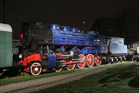 ZAGREB, CROATIA - DECEMBER 13th, 2017: Advent time at the Croatian Railway Museum in Zagreb. 1946 JZ 11-015 Steam locomotive with a separate tender called Blue presidential train, made in Budapest.のeditorial素材