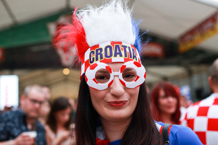 ZAGREB, CROATIA - JUNE 16TH, 2018 : Close up of a woman Croatian football fan on Ban Jelacic Square in Zagreb, Croatia.のeditorial素材