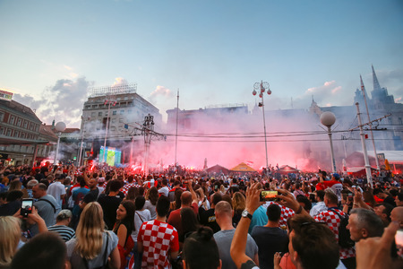 ZAGREB, CROATIA - JULY 7TH, 2018 : Croatian football fans celebrate first Croatian goal of football game quarter final of Croatia vs Russia on Fifa World cup 2018 on Ban Jelacic Square in Zagreb, Croatia.のeditorial素材