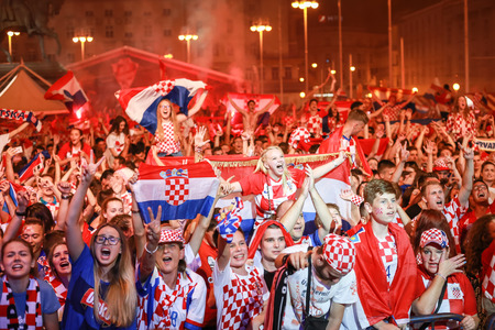 ZAGREB, CROATIA - JULY 7TH, 2018 : Croatian football fans celebrate Croatian quarter final victory over Russia on Fifa World cup 2018 on Ban Jelacic Square in Zagreb, Croatia.のeditorial素材