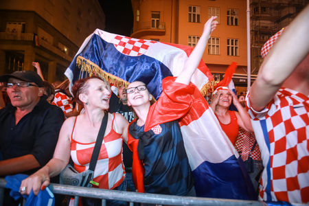 ZAGREB, CROATIA - JULY 7TH, 2018 : Croatian football fans celebrate Croatian quarter final victory over Russia on Fifa World cup 2018 on Ban Jelacic Square in Zagreb, Croatia.のeditorial素材