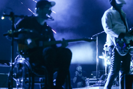 ZAGREB, CROATIA - 27th June, 2018 : Photographer on the stage during performance of american rock band Portugal. The Man performs on the 13th INmusic festival located on the lake Jarun in Zagreb, Croatia.のeditorial素材