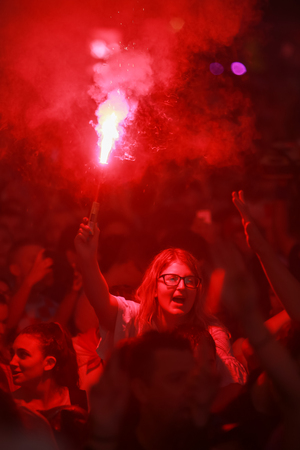 ZAGREB, CROATIA - JULY 11, 2018 : Croatian football fans celebrating victory of 2:1 Croatia vs England in semi finales Fifa World cup 2018 on Ban Jelacic Square in Zagreb, Croatia.のeditorial素材