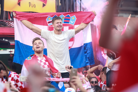 ZAGREB, CROATIA - JULY 15, 2018 : Croatian football fans celebrate second place after losing from France 4-2 in the finals on the World Cup 2018 FIFA on Ban Jelacic Square in Zagreb, Croatia.のeditorial素材