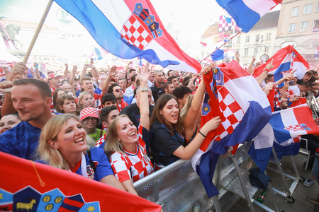 ZAGREB, CROATIA - JULY 15, 2018 : Croatian football fans support national team before and during the World Cup 2018 FIFA, Final game, France vs. Croatia on Ban Jelacic Square in Zagreb, Croatia.のeditorial素材