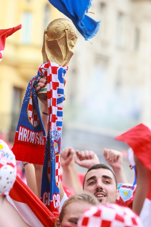 ZAGREB, CROATIA - JULY 15, 2018 : Croatian football fans celebrate second place after losing from France 4-2 in the finals on the World Cup 2018 FIFA on Ban Jelacic Square in Zagreb, Croatia.のeditorial素材