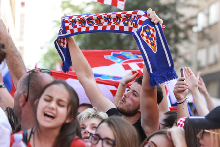 ZAGREB,CROATIA - JULY 16,2018 : Croatia National Team welcome home celebration for 2nd place on Fifa World Cup.Croatian football fans singing while waiting for players to arrive on Ban Jelacic square.のeditorial素材