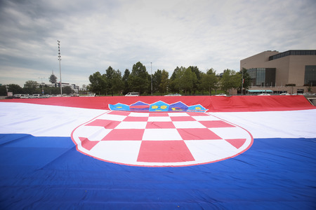ZAGREB, CROATIA - JULY 16, 2018 : A large national flag displayed in front of the National University Library during the National Football Team welcome home celebration in Zagreb, Croatia.のeditorial素材