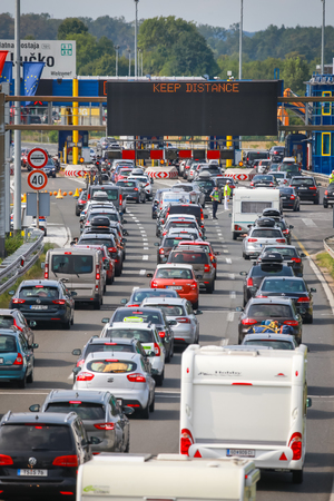 ZAGREB, CROATIA - August 11th, 2018 : Big traffic jam due to the large number of tourists going to the sea coast of Croatia in the Lucko highway toll in Zagreb, Croatia.のeditorial素材