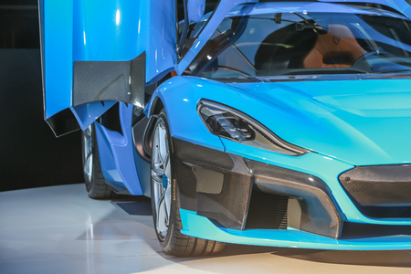 Zagreb, Croatia - 28 September, 2018 : Presentation of Rimac new electric hypercar C Two model with open doors on Strossmayer square.のeditorial素材