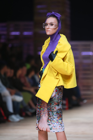 ZAGREB, CROATIA - OCTOBER 25, 2018 : Fashion model wearing clothes for autumn-winter, designed by Twins on the Bipa Fashion.hr fashion show in Zagreb, Croatia.のeditorial素材