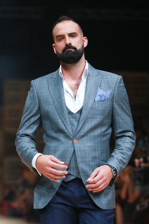 ZAGREB, CROATIA - OCTOBER 27, 2018 : Croatian comedian Ivan Saric wearing clothes for autumn-winter, designed by IK Studio on the Bipa Fashion.hr fashion show in Zagreb, Croatia.のeditorial素材