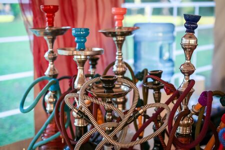 Zagreb, Croatia - 24th June, 2019 : Atmosphere during the 14th INmusic festival located on the lake Jarun in Zagreb, Croatia. Detail of hookahs in chill out zone tent.のeditorial素材