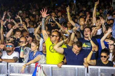 Brezje, Croatia - 19th July, 2019 : Audience during the Forestland, ultimate forest electronic music festival located in Brezje, Croatia.のeditorial素材