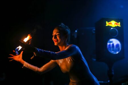 Brezje, Croatia - 19th July, 2019 : A woman juggling with a fire on the stage on the Forestland,...