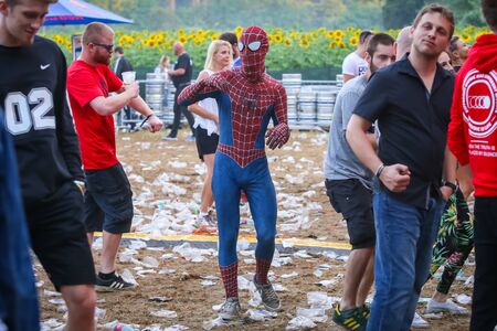 Brezje, Croatia - 20th July, 2019 : Man dressed as Spiderman dancing in the morning on the Forestland, ultimate forest electronic music festival located in Brezje, Croatia.のeditorial素材