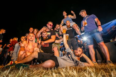 Brezje, Croatia - 20th July, 2019 : Group photo of friends posing and goofing around on the Forestland, ultimate forest electronic music festival located in Brezje, Croatia.のeditorial素材