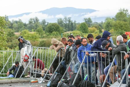 Bregana, Slovenia - September 20, 2015 : A group of male syrian refugees at the slovenian border...