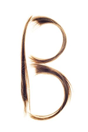 Letters made from woman hair capital B isolated on white background.の写真素材