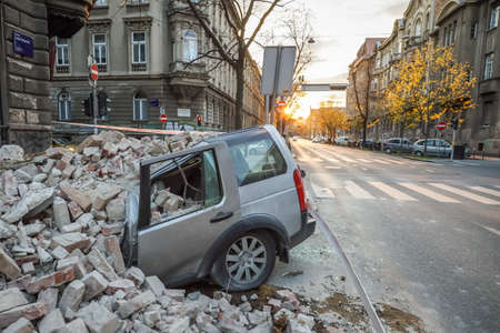 Zagreb, Croatia - March 22, 2020 : In the morning capital of Croatia, Zagreb has been hit by the magnitude of the earthquake 5.5 per Richter. Cars have been destroyed by fallen parts of the building.のeditorial素材