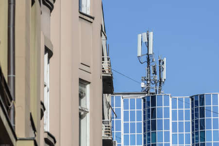 Zagreb, Croatia - April 15, 2020 : Cell sites on the roof of a apartment building in downtown of...