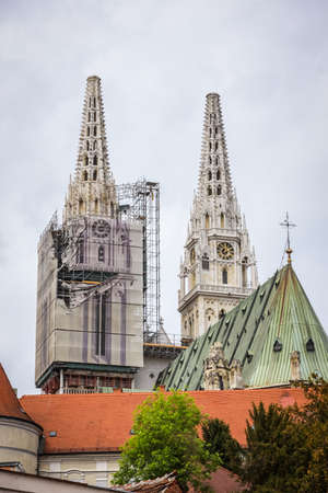 Zagreb, Croatia - 15 April, 2020 : The Zagreb cathedral without both crosses on the top of the towers after earthquake that have damage it in Zagreb, Croatia.のeditorial素材