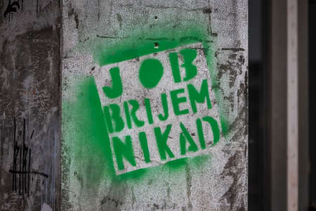 Zagreb, Croatia - 5 May, 2020 : Graffiti on the wall that says, Job I think never, on the street in...