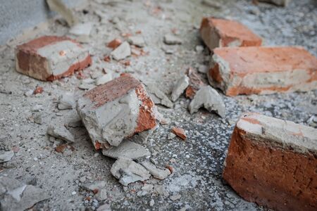 Scattered and damaged bricks on the balcony of the house after a strong earthquake of 5.5 on the Richter scale one month ago in Zagreb, Croatiaの写真素材